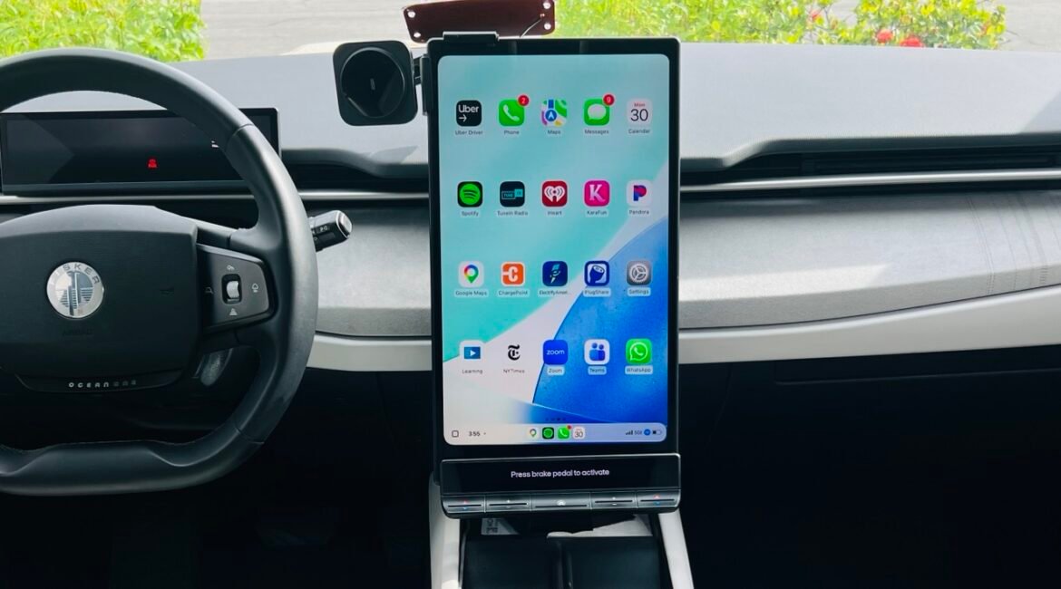 View of the interior of Fisker with CarPlay on the screen