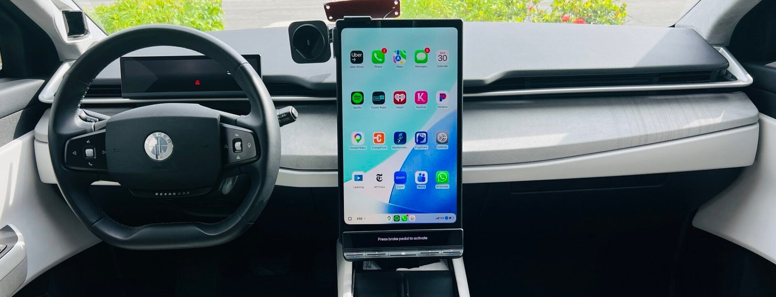 View of the interior of Fisker with CarPlay on the screen
